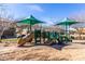 Community playground with slides and green sun shades for to have some fun at 2658 S Sulley Dr # 102, Gilbert, AZ 85295
