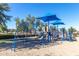 Community playground featuring modern equipment and sun shades, perfect for  at 2658 S Sulley Dr # 102, Gilbert, AZ 85295