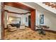 Sitting area with two chairs and table, ornate flooring and trim at 26796 N 98Th Way, Scottsdale, AZ 85262