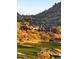 Beautiful custom home nestled on golf course with mountain views and desert landscaping at 26796 N 98Th Way, Scottsdale, AZ 85262
