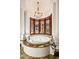 Beautiful bathtub with natural lighting and decorative tile at 26796 N 98Th Way, Scottsdale, AZ 85262