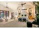 Spacious main bedroom with vaulted ceilings, sitting area, and natural lighting at 26796 N 98Th Way, Scottsdale, AZ 85262