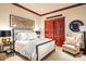 Comfortable main bedroom features neutral tones and a cozy seating area at 26796 N 98Th Way, Scottsdale, AZ 85262