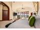 Comfortable main bedroom featuring scenic views, a fireplace, and carpet at 26796 N 98Th Way, Scottsdale, AZ 85262