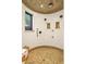 Large, tiled walk-in shower with mosaic tile flooring and multiple shower heads at 26796 N 98Th Way, Scottsdale, AZ 85262