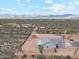 Aerial view of desert home surrounded by desert landscape at 27420 N 170Th St, Rio Verde, AZ 85263