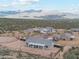 Expansive aerial view of desert homes boasting mountain views at 27420 N 170Th St, Rio Verde, AZ 85263