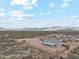 Aerial view of desert home with fenced yard and mountain backdrop at 27420 N 170Th St, Rio Verde, AZ 85263