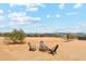 Desert backyard with firepit and chairs at 27420 N 170Th St, Rio Verde, AZ 85263
