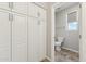 Bathroom with built-in storage cabinets and adjacent toilet room at 27420 N 170Th St, Rio Verde, AZ 85263
