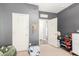 A bedroom featuring gray paint, an open closet, and plenty of room to play at 30370 N Opal Dr, San Tan Valley, AZ 85143