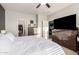 A relaxing bedroom is complete with walk-in closet and en suite bath at 30370 N Opal Dr, San Tan Valley, AZ 85143