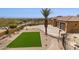 Aerial view showcasing circular drive, garages, and a meticulously landscaped yard with mountain views at 3312 N 89Th Pl, Mesa, AZ 85207