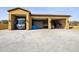 Expansive garage featuring multiple bays, providing ample space for vehicle and equipment storage at 3312 N 89Th Pl, Mesa, AZ 85207