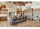 Spacious kitchen featuring an oversized granite island and top-of-the-line appliances at 3312 N 89Th Pl, Mesa, AZ 85207