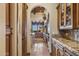 Gourmet kitchen featuring granite countertops and stainless appliances at 3312 N 89Th Pl, Mesa, AZ 85207