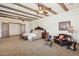 Bright main bedroom featuring a seating area, king-size bed, and elegant furnishings at 3312 N 89Th Pl, Mesa, AZ 85207