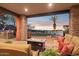 A well-appointed outdoor space features a fire pit and comfortable seating for guests at 3312 N 89Th Pl, Mesa, AZ 85207
