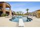 Beautiful pool area complete with a diving board and slide for endless summer fun at 3312 N 89Th Pl, Mesa, AZ 85207