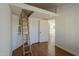 Bedroom featuring wood flooring, closet with ladder at 3327 W Mohawk Ln, Phoenix, AZ 85027