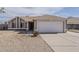 Charming single-story home featuring a two-car garage and low maintenance desert landscaping at 3327 W Mohawk Ln, Phoenix, AZ 85027