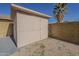 Convenient backyard shed with ample storage space, set against a block wall and gravel landscape at 3327 W Mohawk Ln, Phoenix, AZ 85027
