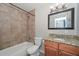 Bathroom featuring shower over tub and granite vanity at 352 E Beatryce St, Tempe, AZ 85288