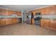 Spacious kitchen with granite countertops, stainless steel appliances, and ample cabinet space at 352 E Beatryce St, Tempe, AZ 85288
