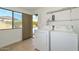Laundry room with washer, dryer, and door to pool at 352 E Beatryce St, Tempe, AZ 85288