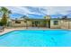 A refreshing backyard pool with an adjacent covered patio offering a relaxing outdoor living space at 352 E Beatryce St, Tempe, AZ 85288