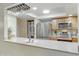 Kitchen includes stone countertops and stainless steel appliances at 3907 W Sharon Ave, Phoenix, AZ 85029