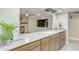 Well-appointed kitchen with stone countertops and stainless steel appliances at 3907 W Sharon Ave, Phoenix, AZ 85029