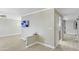 Open-concept living area with modern flooring, neutral paint, and sleek ceiling fan at 3907 W Sharon Ave, Phoenix, AZ 85029
