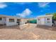 Spacious backyard with detached workshop/shed, gravel landscaping, and plenty of room for entertaining at 5422 E Des Moines St, Mesa, AZ 85205