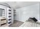 This bedroom features a bed, carpet, curtains, and a small closet at 5422 E Des Moines St, Mesa, AZ 85205