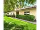 Charming single-story home with lush green lawn, mature landscaping, and a tiled roof at 5465 N 78Th St, Scottsdale, AZ 85250