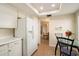 Kitchen featuring stainless steel appliances and a breakfast table, leading to other rooms at 5465 N 78Th St, Scottsdale, AZ 85250