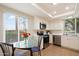 Bright kitchen featuring stainless steel appliances and a cozy breakfast nook with scenic views at 5465 N 78Th St, Scottsdale, AZ 85250