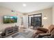 Inviting living room featuring a sliding door and comfortable seating at 5465 N 78Th St, Scottsdale, AZ 85250
