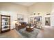 Open living room showcases a sofa, patterned chairs, and a painting of sail boats at 5465 N 78Th St, Scottsdale, AZ 85250