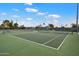 Well-maintained community tennis courts in a lovely setting with a privacy fence at 5465 N 78Th St, Scottsdale, AZ 85250