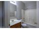 Standard bathroom with a vanity, mirror, toilet, and a shower-tub combo at 6538 W Elwood St, Phoenix, AZ 85043