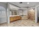 Bathroom featuring tile flooring, a separate tub, shower, and double sinks at 7164 W Paso Trl, Peoria, AZ 85383