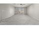 Spacious carpeted bedroom with sliding glass doors to the backyard at 7164 W Paso Trl, Peoria, AZ 85383
