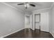 Bedroom featuring hardwood floors and a ceiling fan at 7164 W Paso Trl, Peoria, AZ 85383