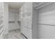 Walk-in closet featuring multiple shelves and drawers, providing ample storage space at 7164 W Paso Trl, Peoria, AZ 85383