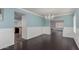 Formal dining room with hardwood floors, wainscoting, and a chandelier at 7164 W Paso Trl, Peoria, AZ 85383