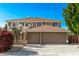 Charming two-story home featuring a three-car garage and a beautiful tile roof at 7164 W Paso Trl, Peoria, AZ 85383