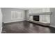 Living room with modern fireplace and light gray paint at 7164 W Paso Trl, Peoria, AZ 85383