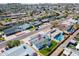 Aerial view of the property and neighborhood with mountains in the background at 7346 E Mckinley St, Scottsdale, AZ 85257